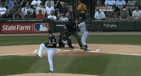 In yellow behind home plate, handing out hot dogs and Polish sausage, dual saddle bag style.